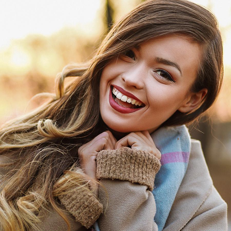 young woman with a nice smile from cosmetic dentistry